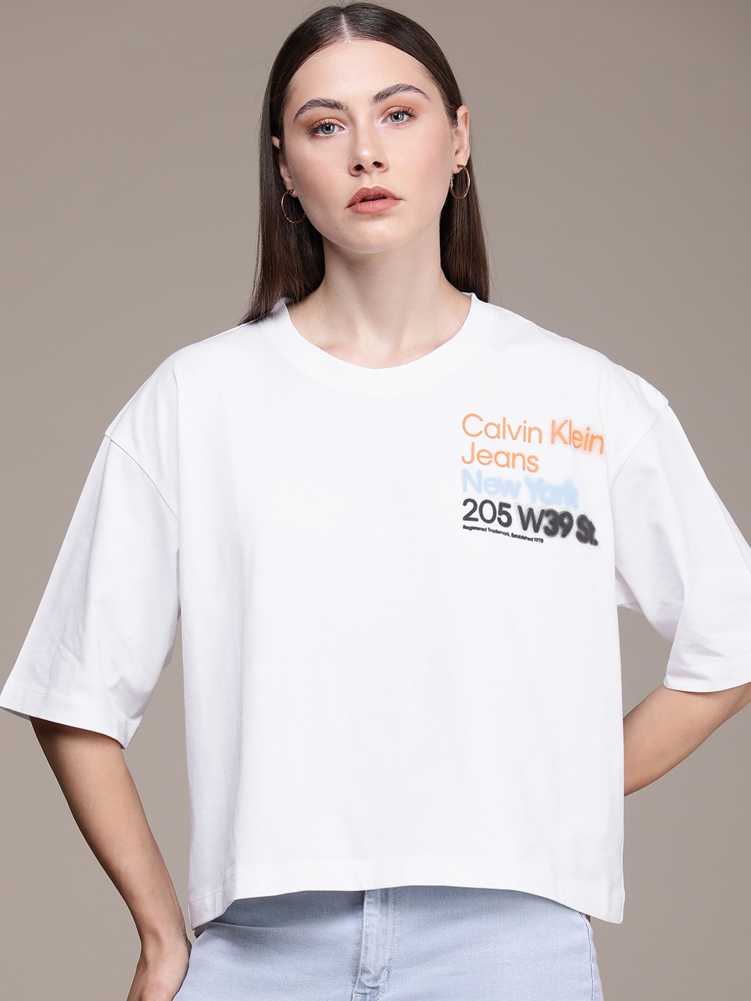 

Calvin Klein Jeans Typography Printed Drop-Shoulder Sleeves Pure Cotton T-shirt, White