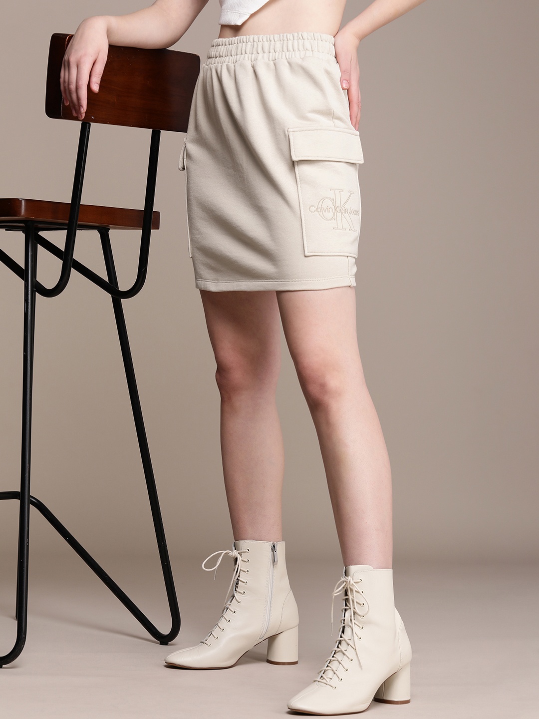

Calvin Klein Jeans Women Self-Design Pure Cotton Straight Skirt, Beige