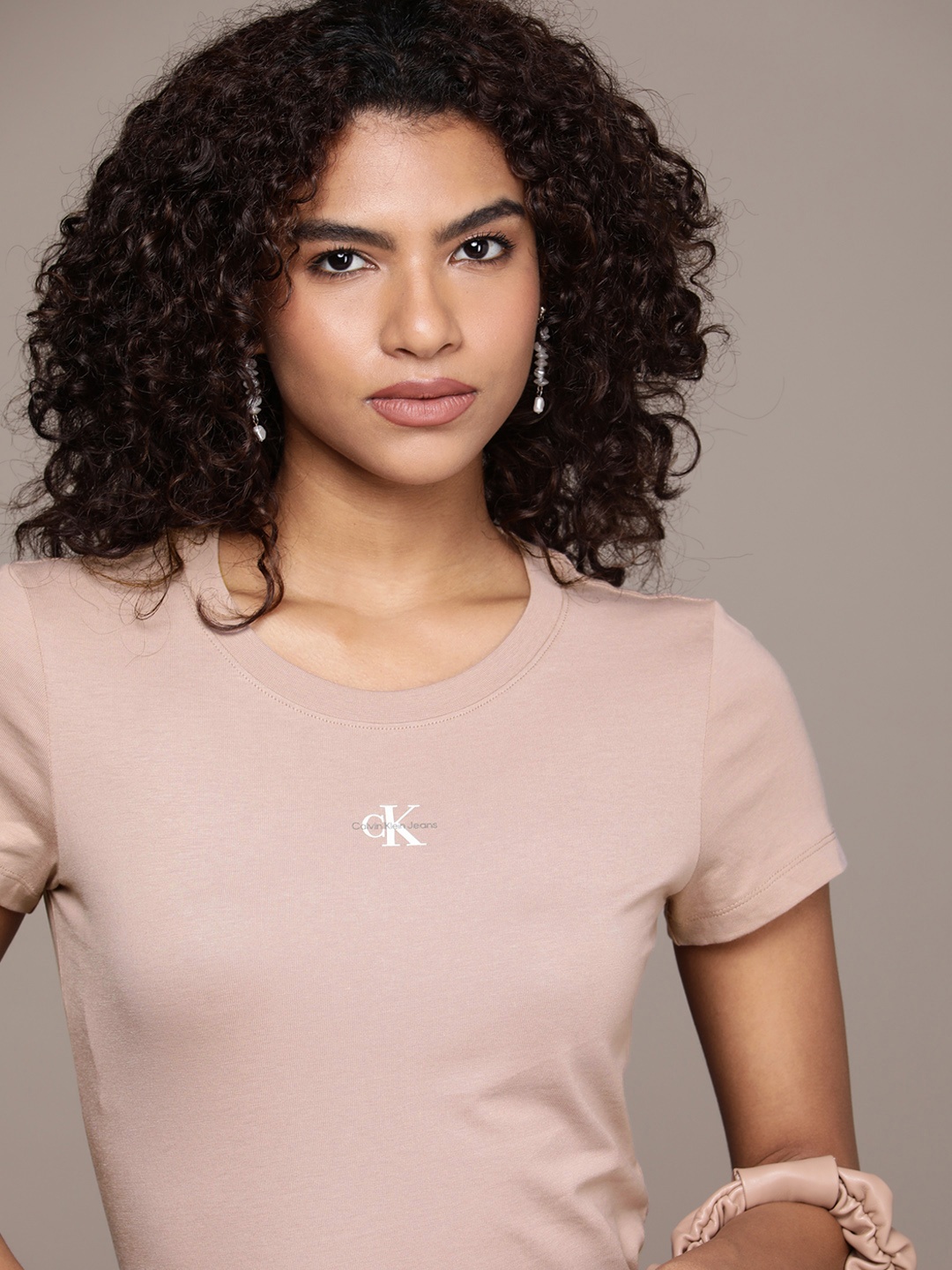 

Calvin Klein Jeans Women Pure Cotton Round Neck T-shirt, Mauve