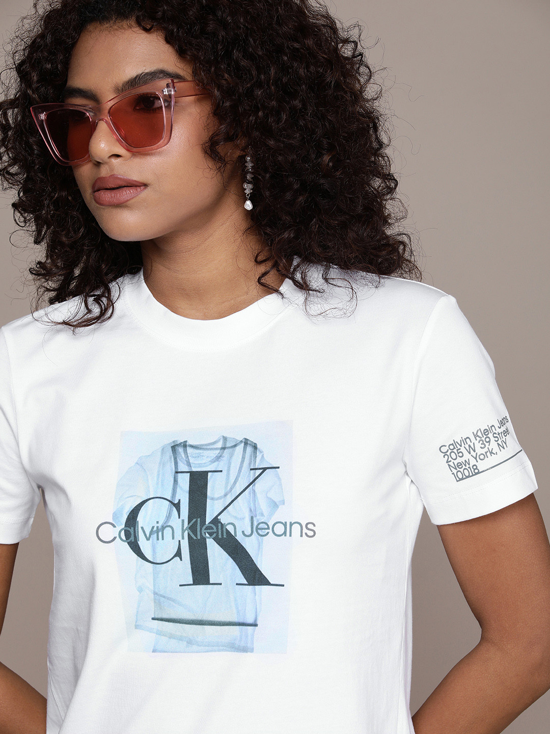 

Calvin Klein Jeans Women Pure Cotton Brand Logo Printed T-shirt, White