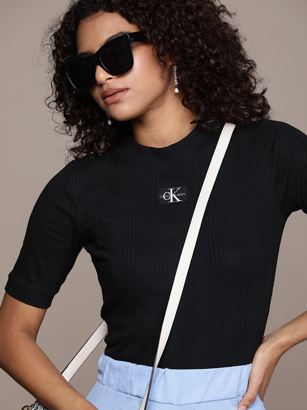 

Calvin Klein Jeans Women Slim Fit T-shirt With Applique Detail, Black