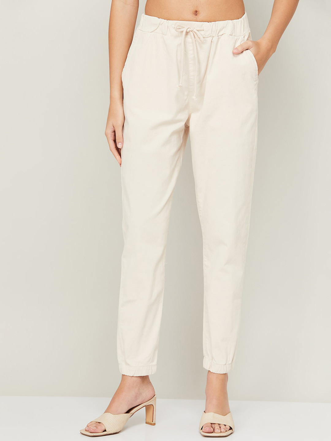 

CODE by Lifestyle Women Tapered Fit Easy Wash Cotton Trousers, Beige