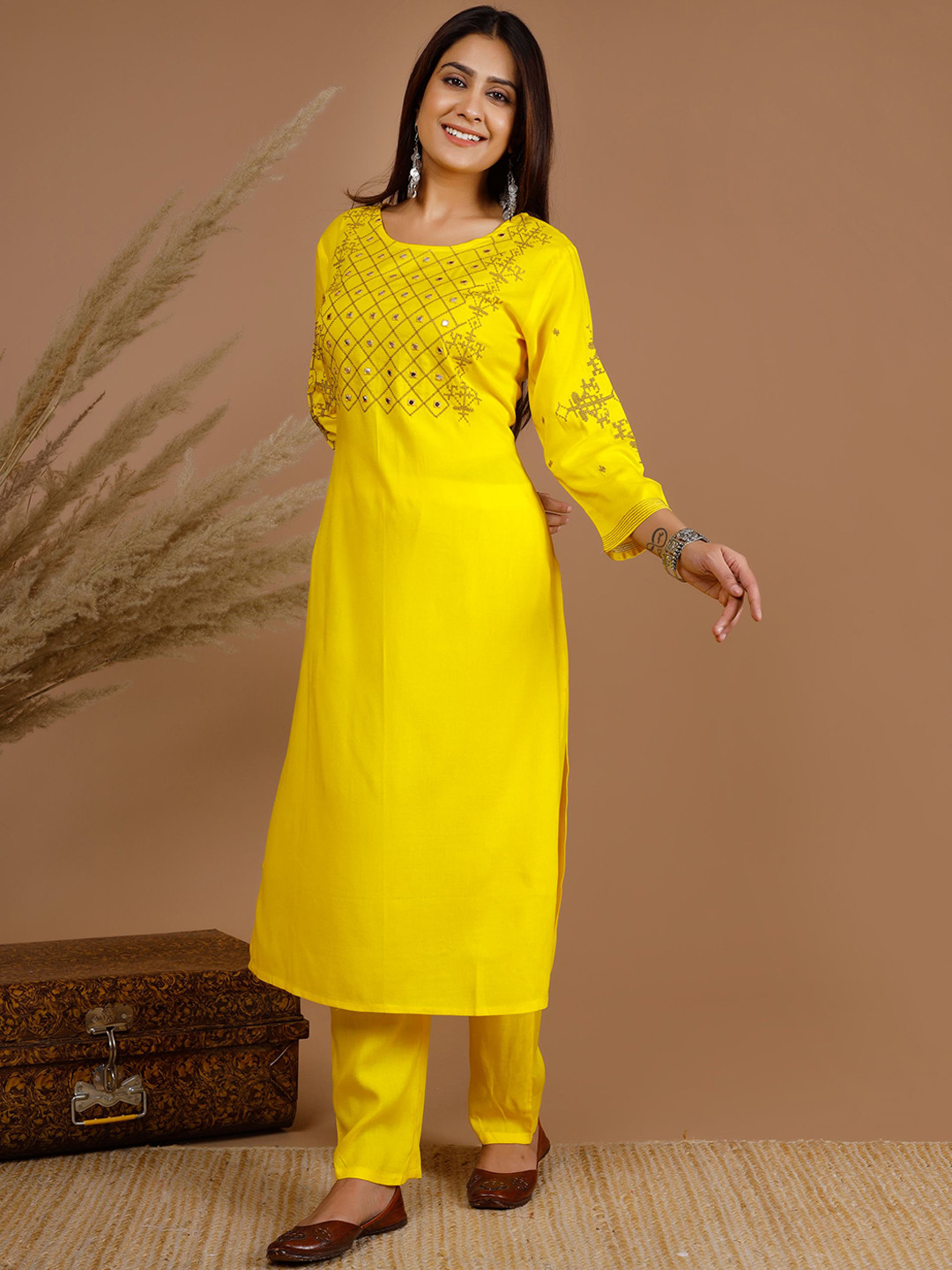 

Tetalee Women Ethnic Motifs Embroidered Mirror Work Kurta With Trousers, Yellow