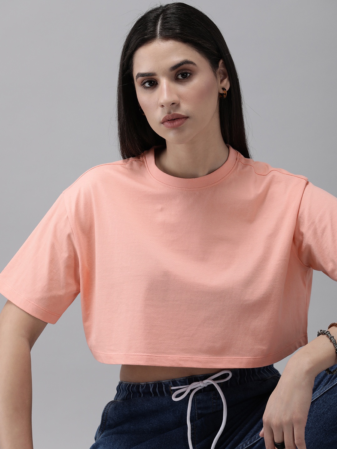 

Roadster Women Solid Boxy Crop T-shirt, Coral
