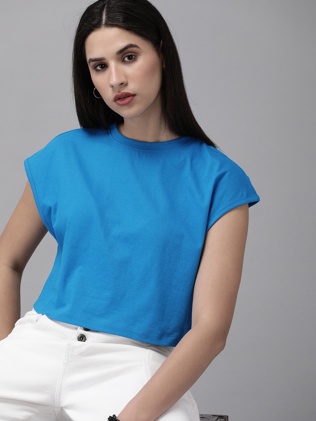 

Roadster Women Solid Boxy Crop T-shirt, Blue
