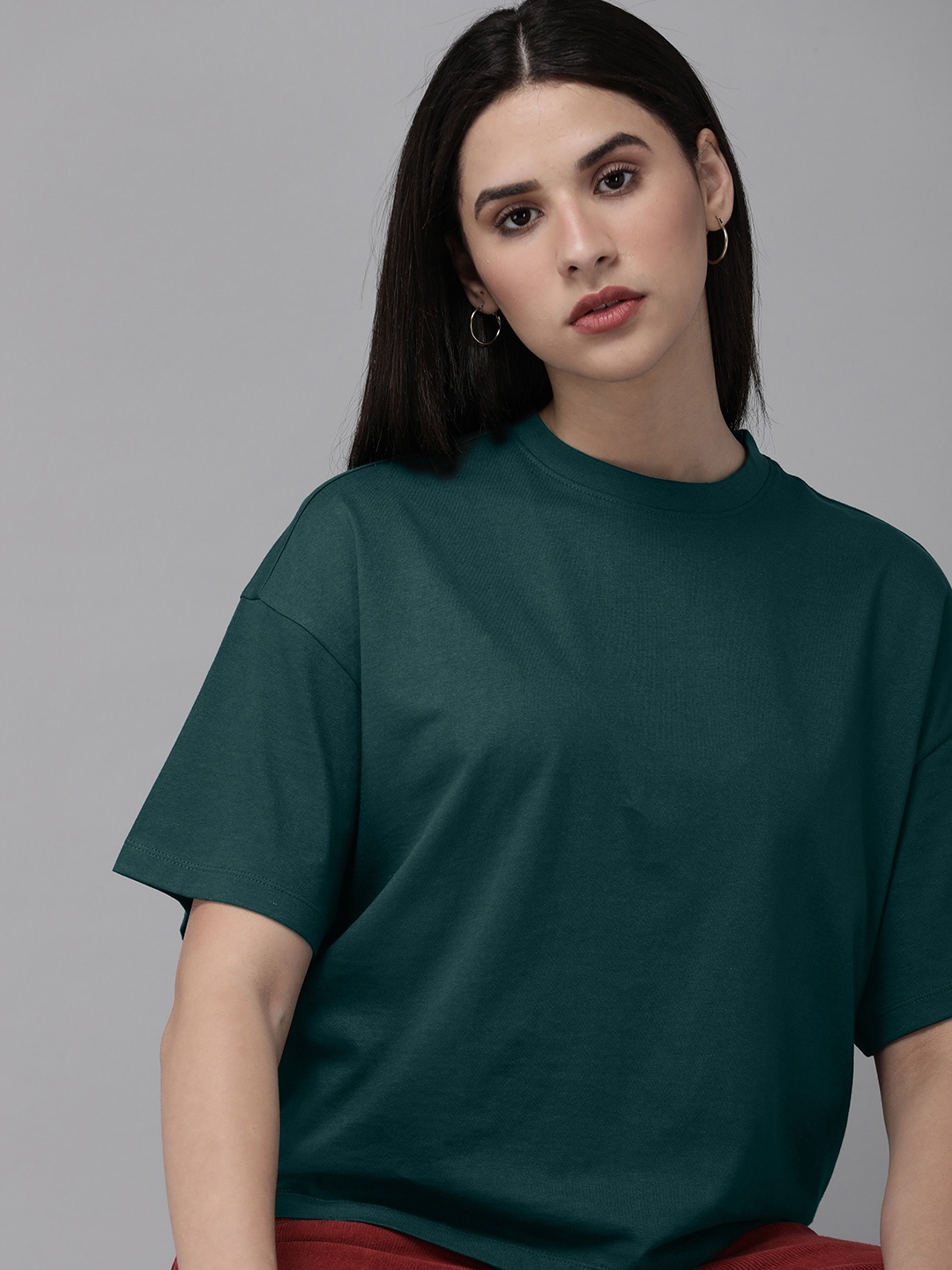 

Roadster Women Solid Boxy T-shirt, Green