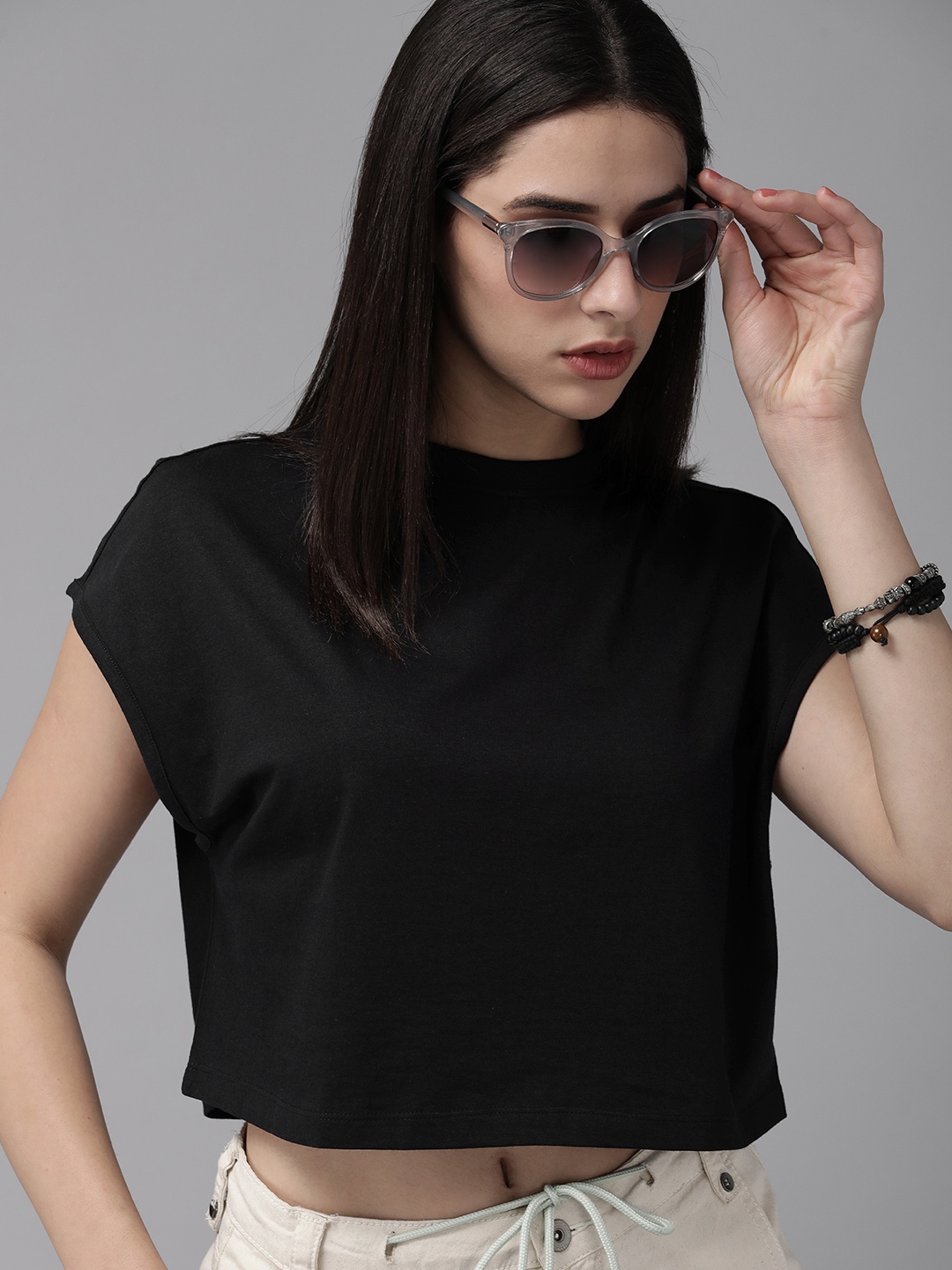 

Roadster Women Solid Boxy Crop T-shirt, Black