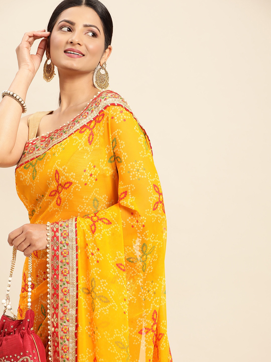 

Mitera Red & Yellow Bandhani Beads and Stones Half and Half Bandhani Saree