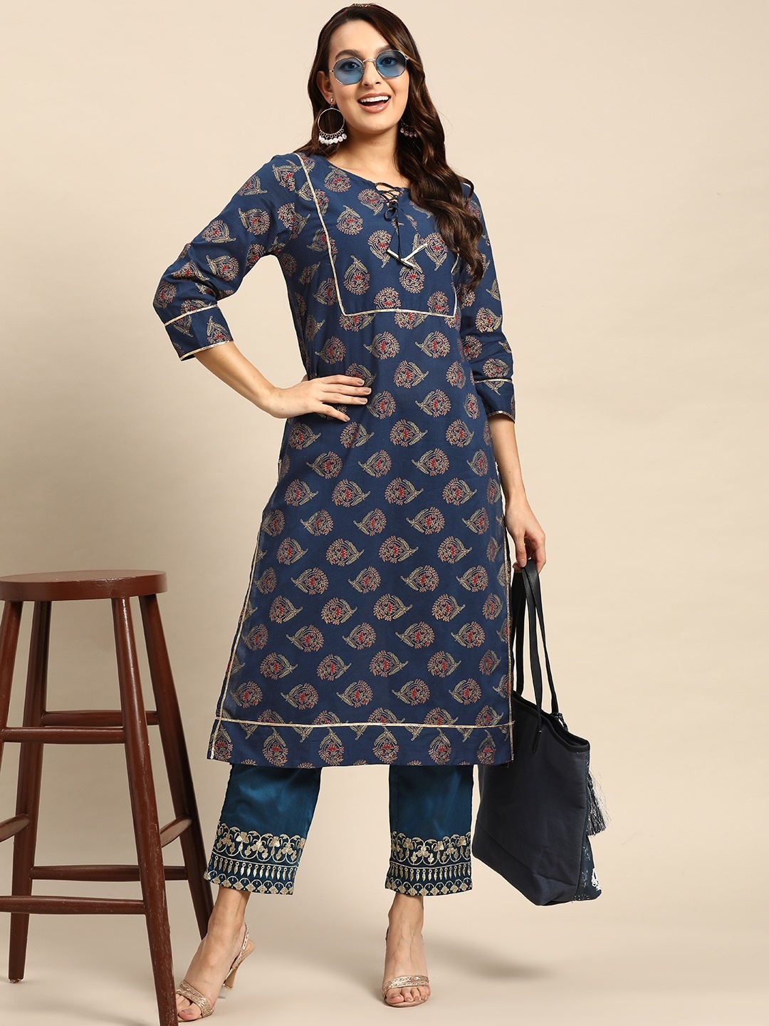 

Sangria Women Floral Printed Tie-Up Neck Gotta Patti Kurta, Blue