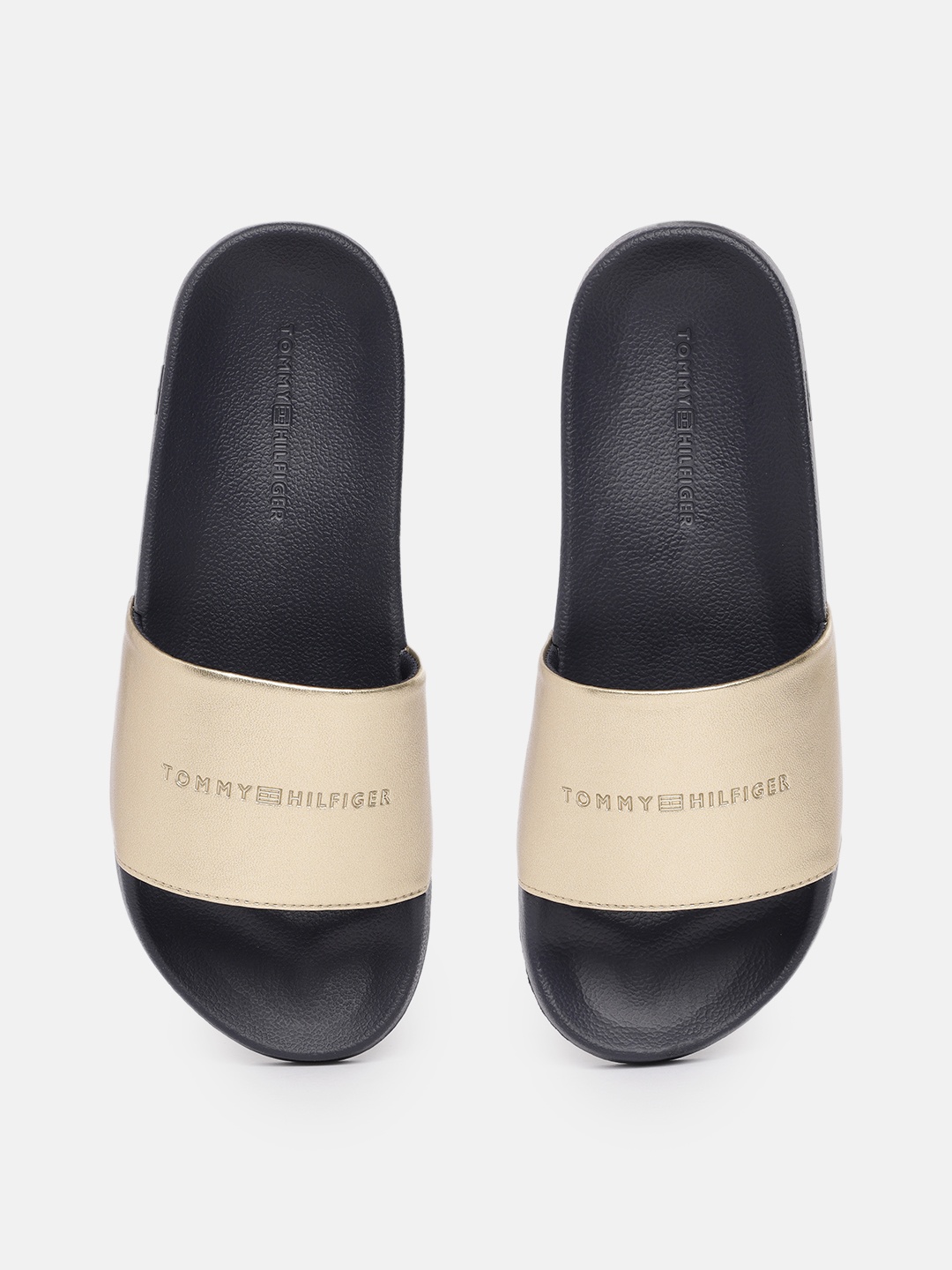 

Tommy Hilfiger Women Solid Sliders, Gold