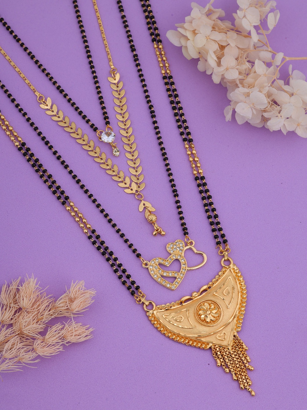 

Brado Jewellery Tanmaniya Set Of 4 Gold-Plated AD Stone-Studded & Black-Beaded Mangalsutra