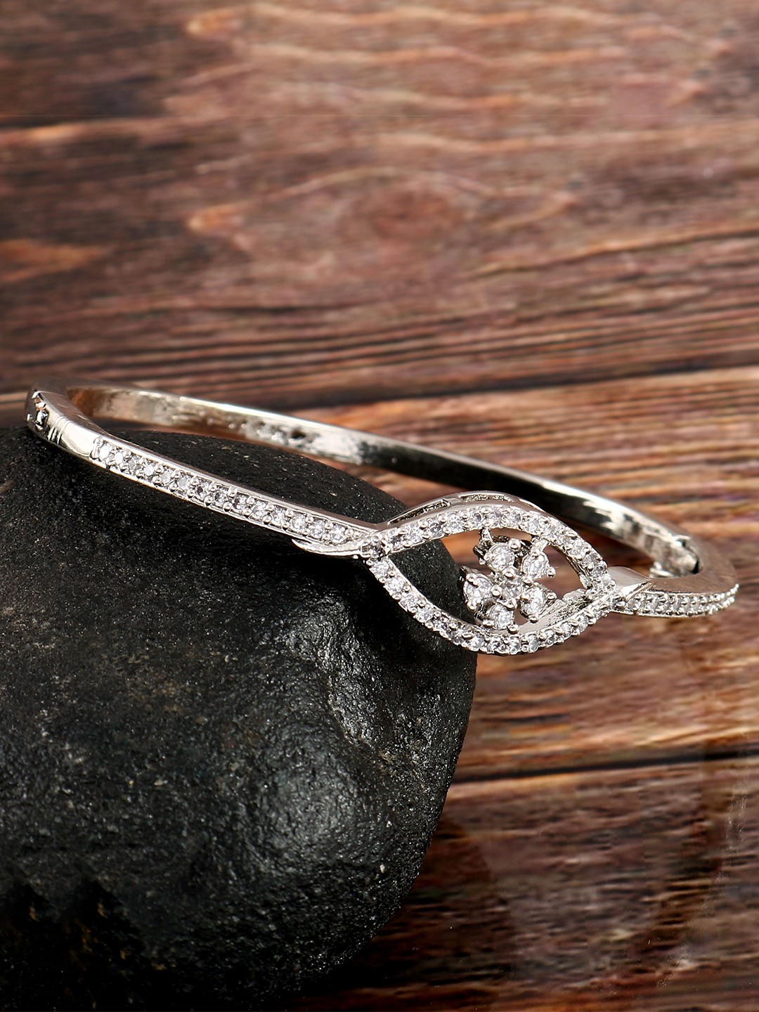

Jewar Mandi Women Brass Cubic Zirconia Antique Silver-Plated Bangle-Style Bracelet