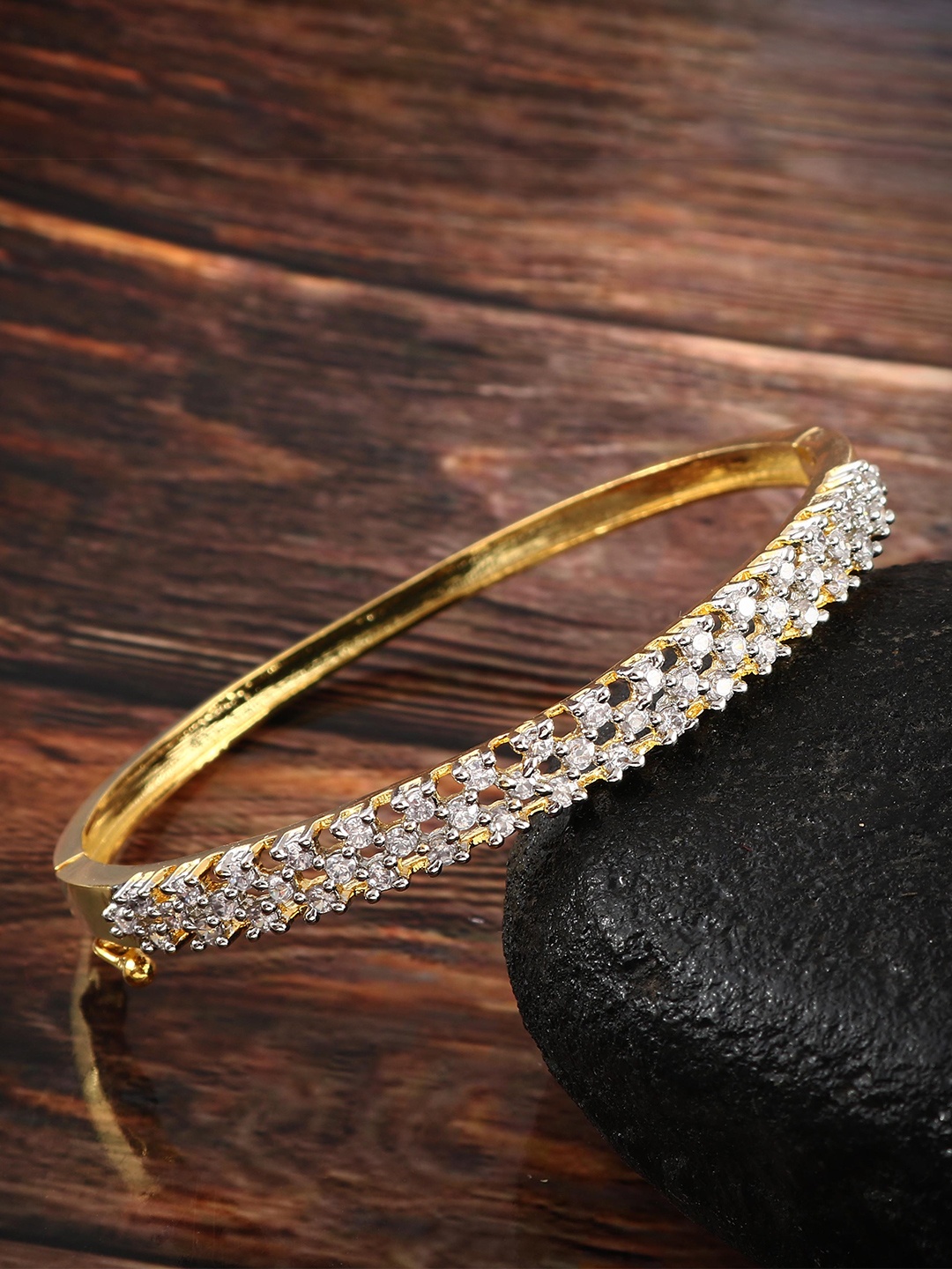

Jewar Mandi Women Brass Cubic Zirconia Antique Gold-Plated Bangle-Style Bracelet