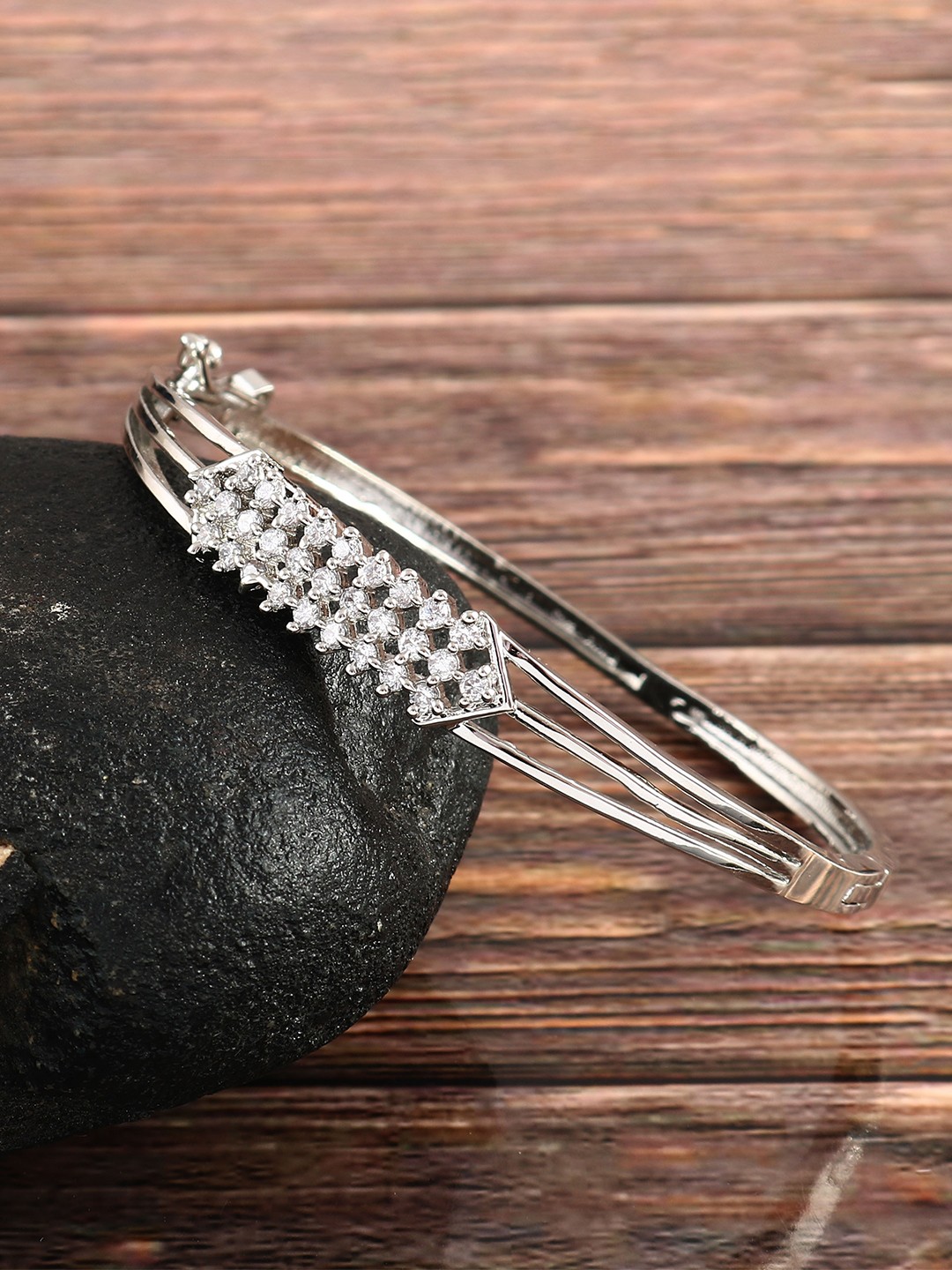 

Jewar Mandi Women Brass Cubic Zirconia Antique Silver-Plated Bangle-Style Bracelet