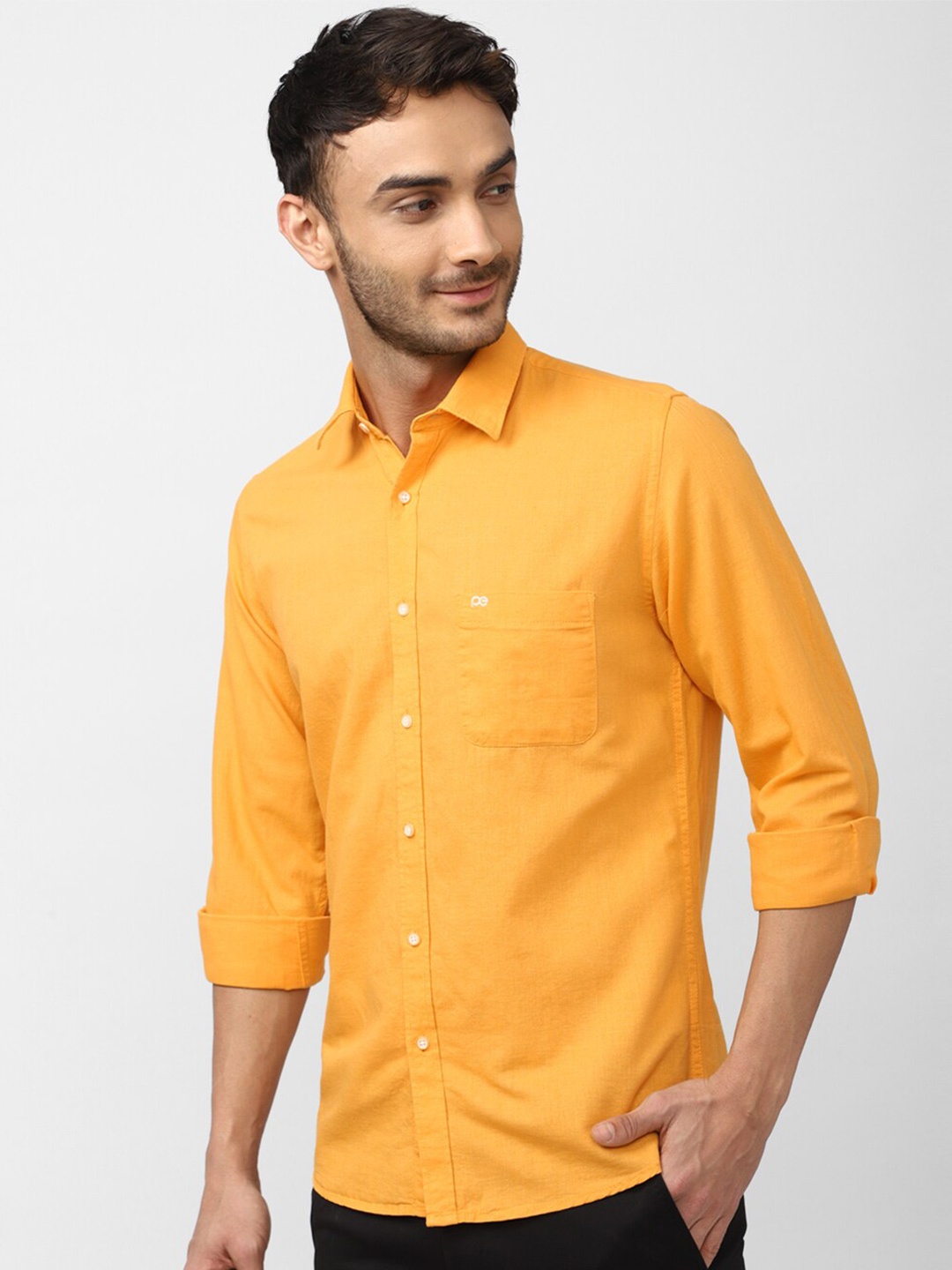 

Peter England Casuals Men Solid Slim Fit Casual Shirt, Orange