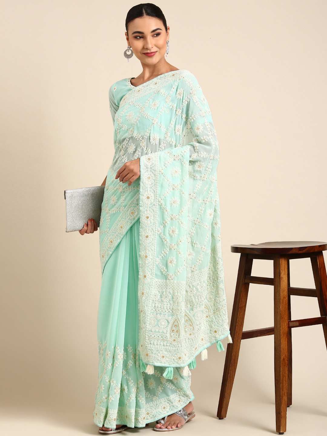 

Shaily Ethnic Motifs Embroidered Chikankari Pure Georgette Saree, Turquoise blue