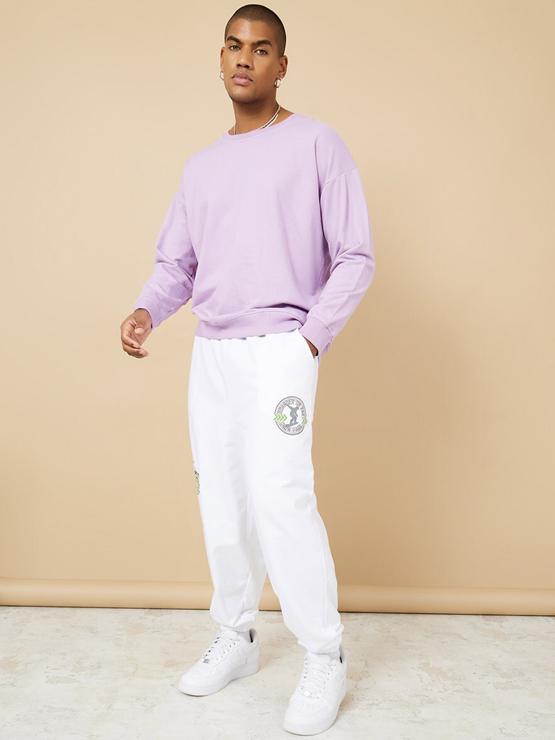 

Styli Men Oversized Varsity Side Print Joggers, White
