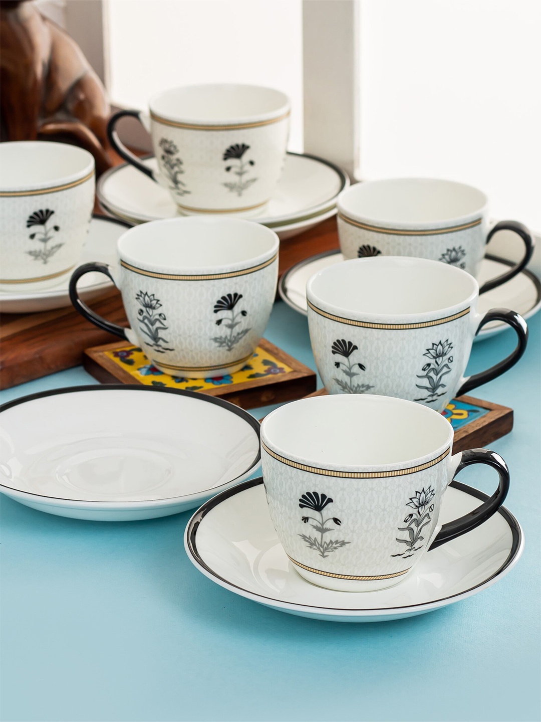 

CLAY CRAFT White & Black 12 Pcs Floral Printed Ceramic Glossy Cups and Saucers 180 ml Each