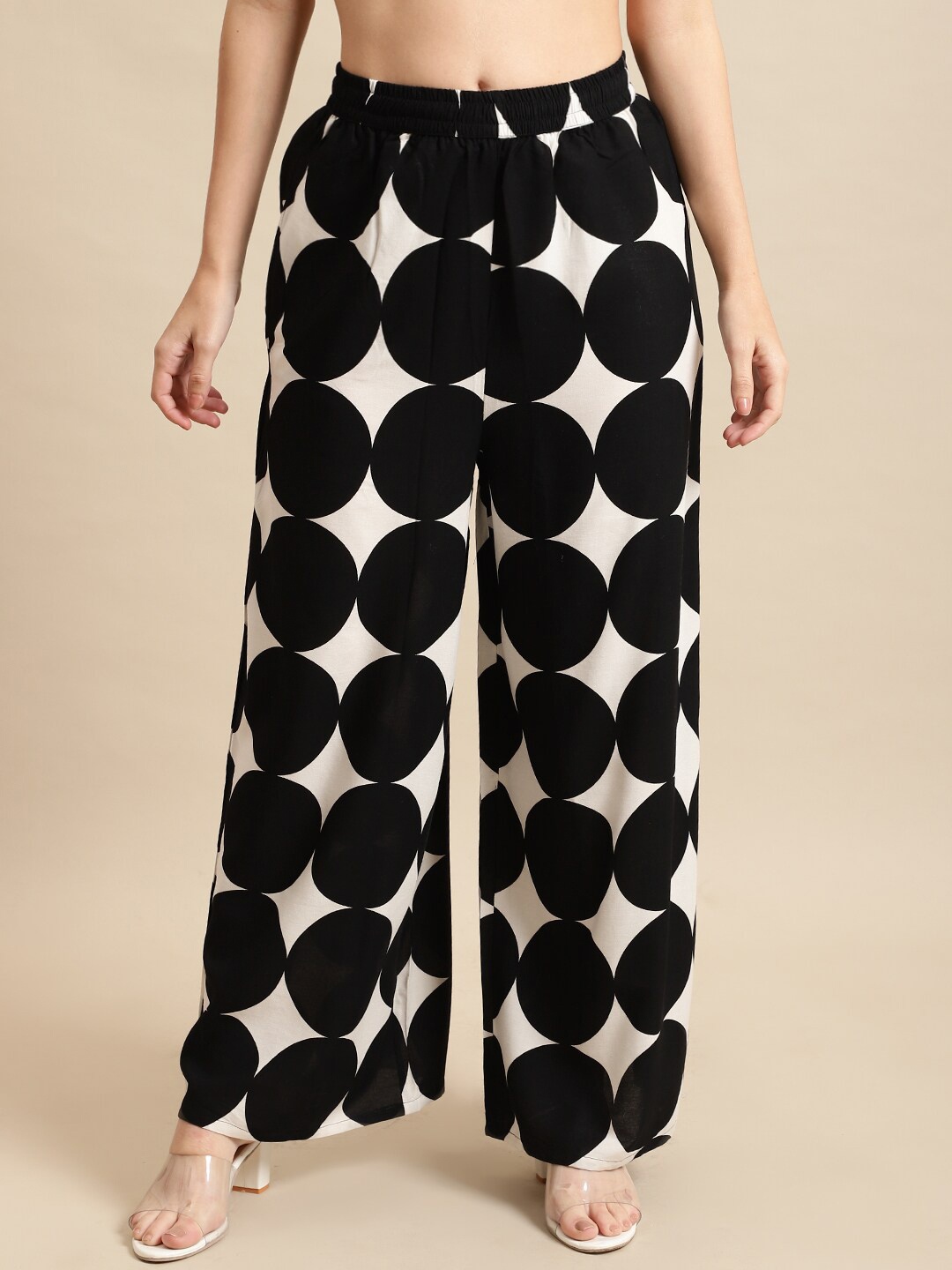 

Pistaa Women Printed Flared Palazzos, Black