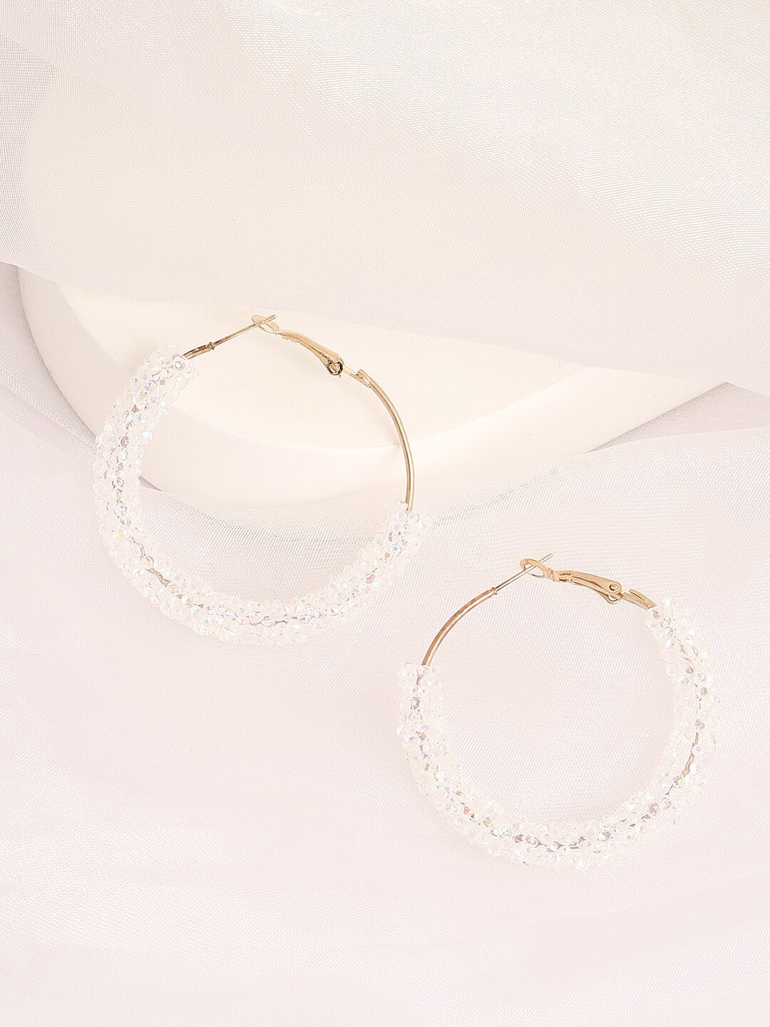 

SOHI White & Gold-Toned Contemporary Hoop Earrings