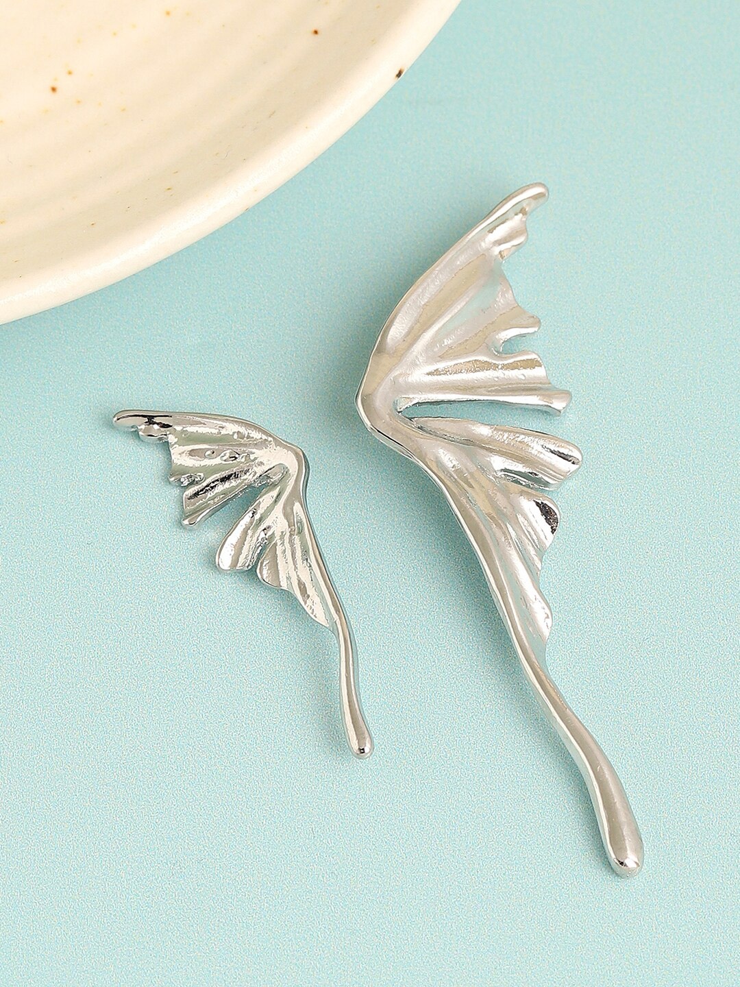 

SOHI Silver-Plated Contemporary Drop Earrings