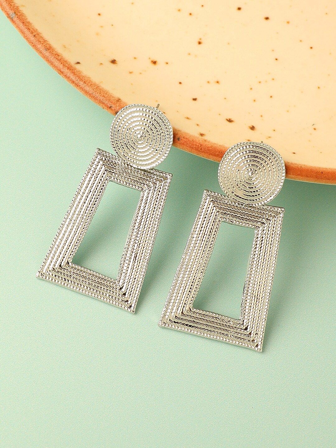 

SOHI Silver Plated Contemporary Drop Earrings