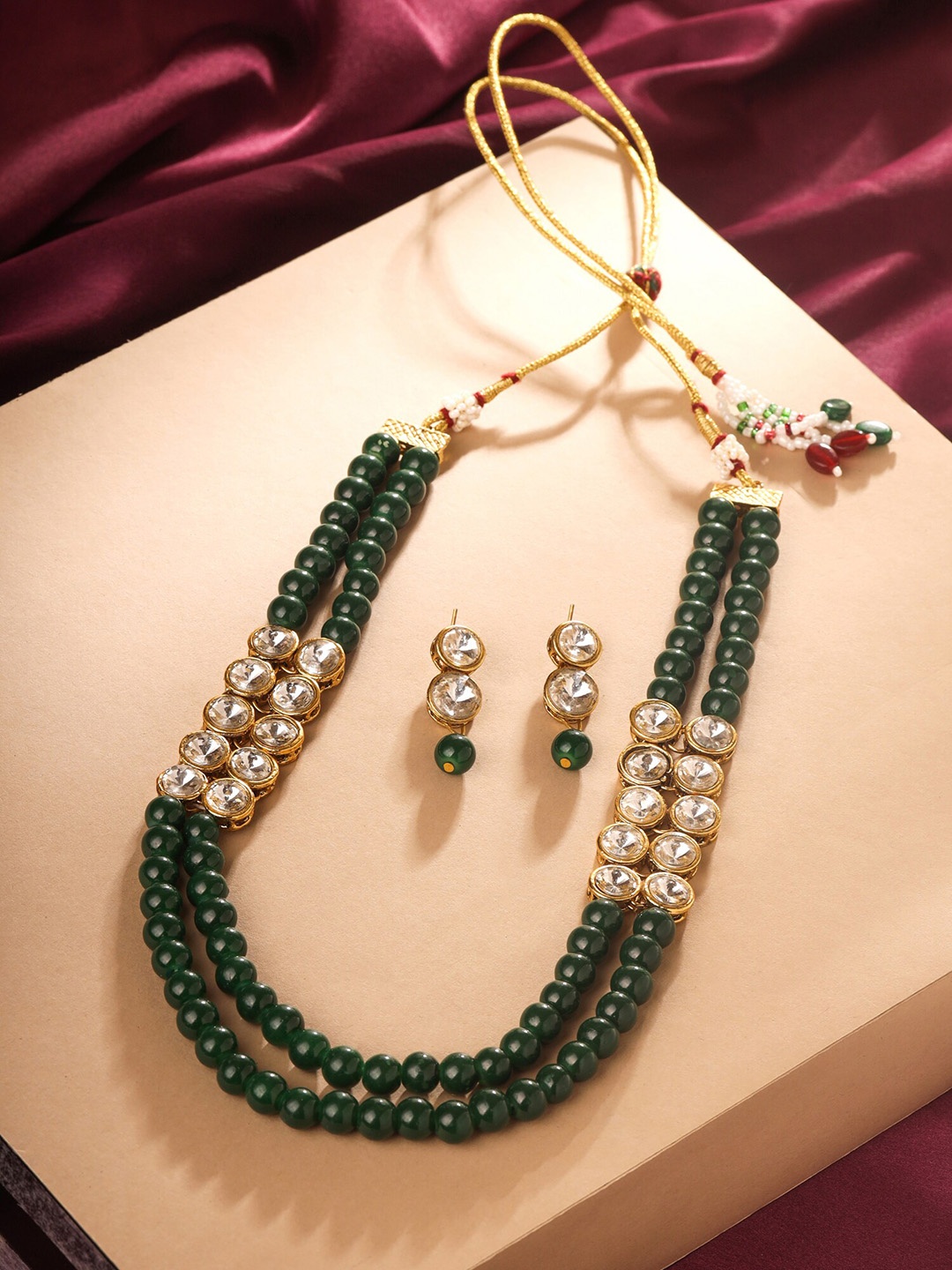 

Yellow Chimes Gold-Plated Stone-Studded & Pearl Beaded Jewellery Set