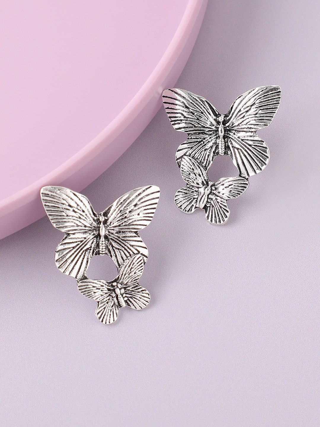 

SOHI Silver Plated Contemporary Studs Earrings