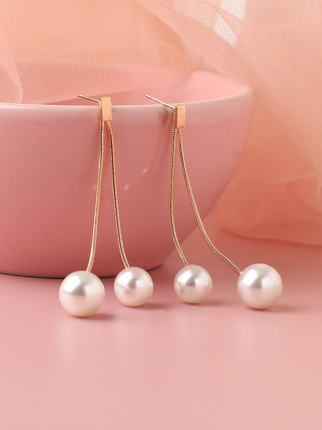 

SOHI Gold Plated Contemporary Drop Earrings