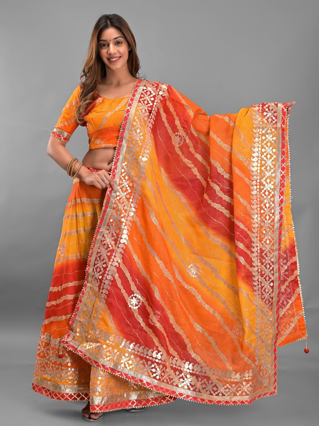 

Apratim Ready to Wear Lehenga & Unstitched Blouse With Dupatta, Orange