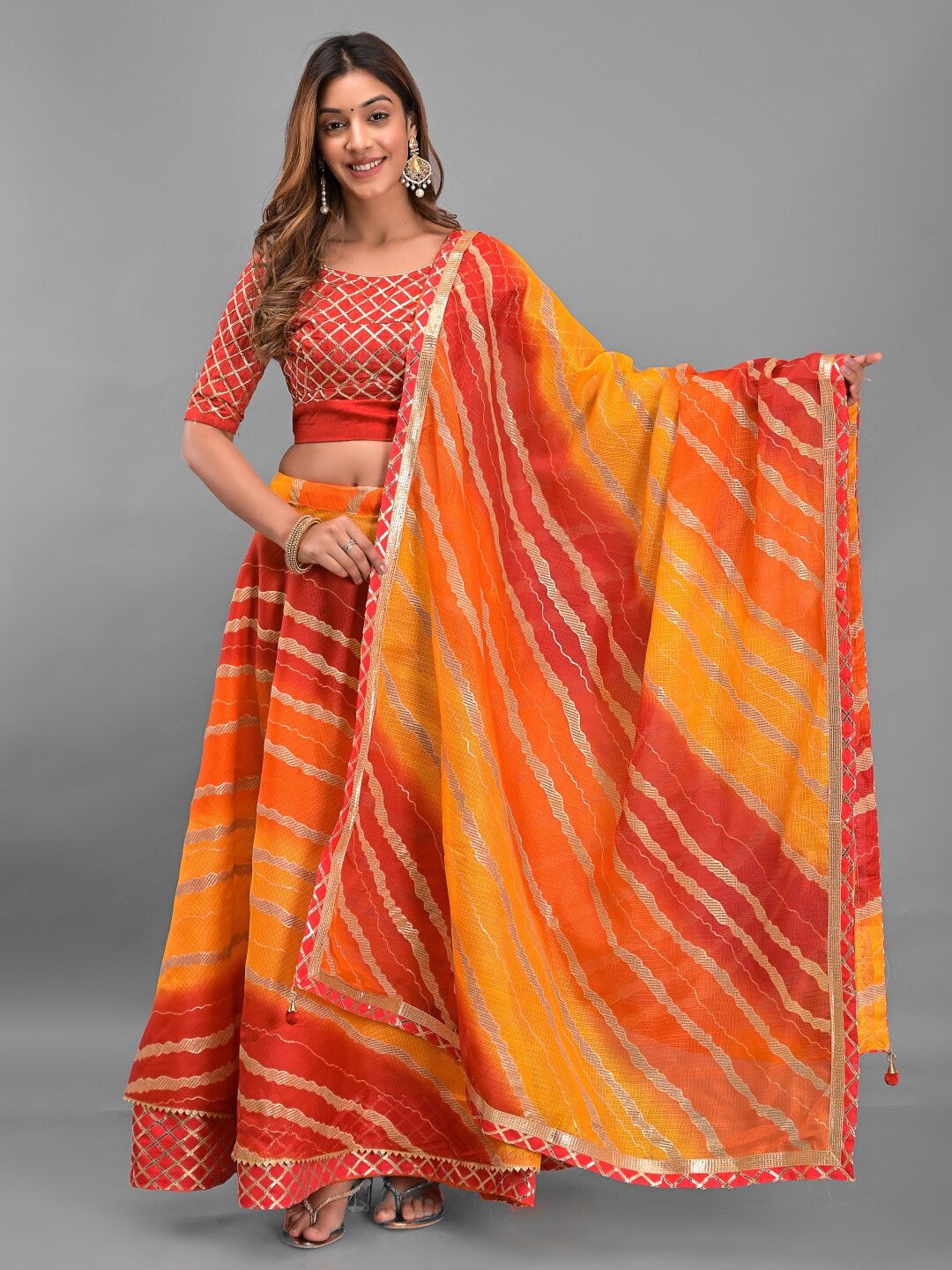 

Apratim Cotton Ready to Wear Lehenga & Unstitched Blouse With Dupatta, Orange