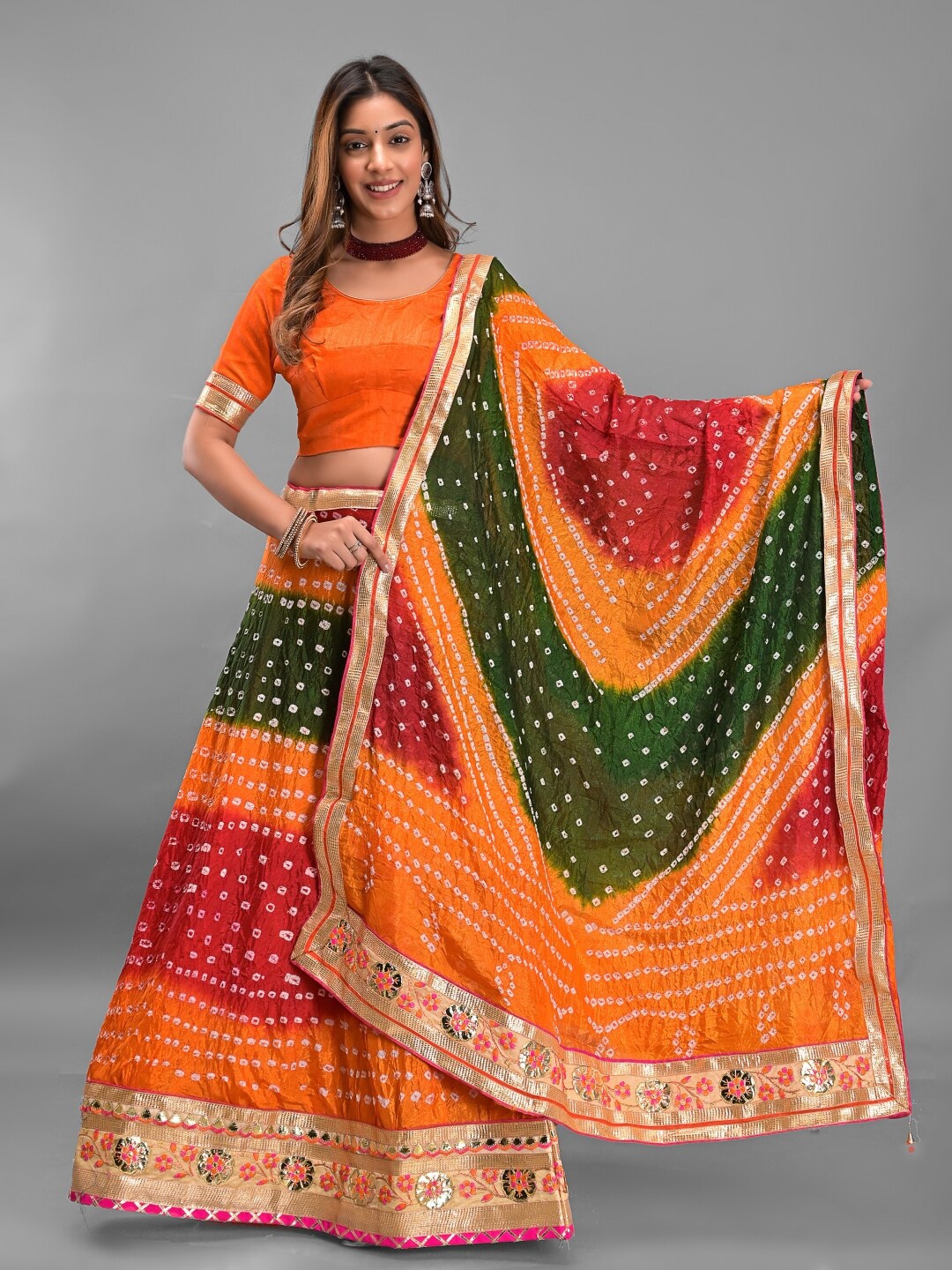

Apratim Ready to Wear Lehenga & Unstitched Blouse With Dupatta, Orange