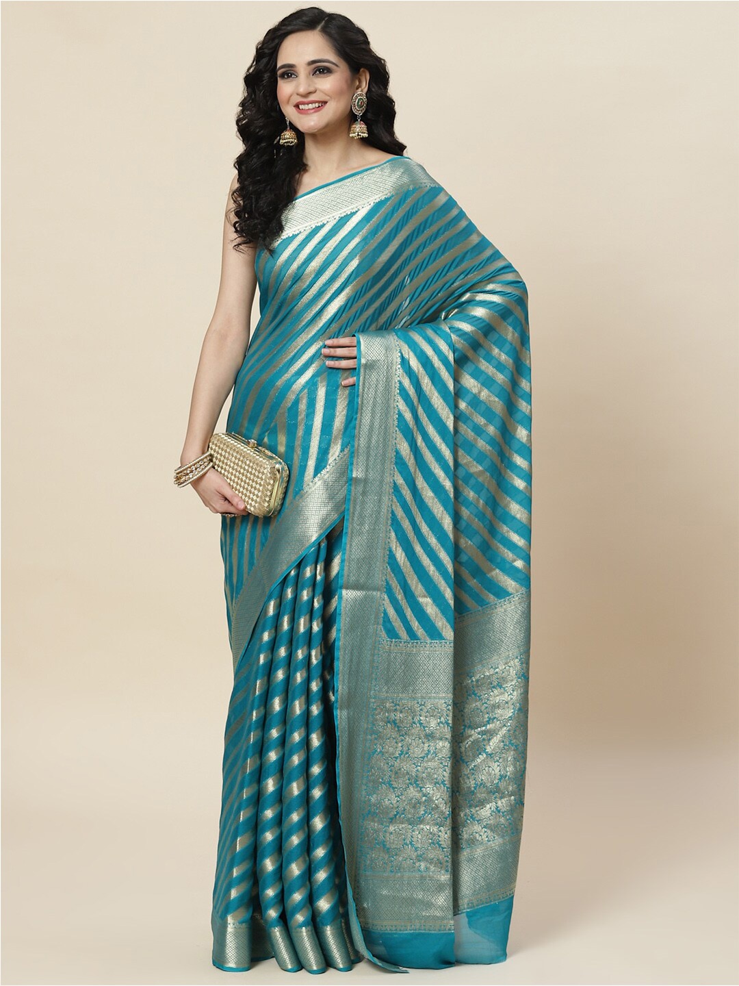 

Meena Bazaar Blue & Gold-Toned Woven Design Zari Saree