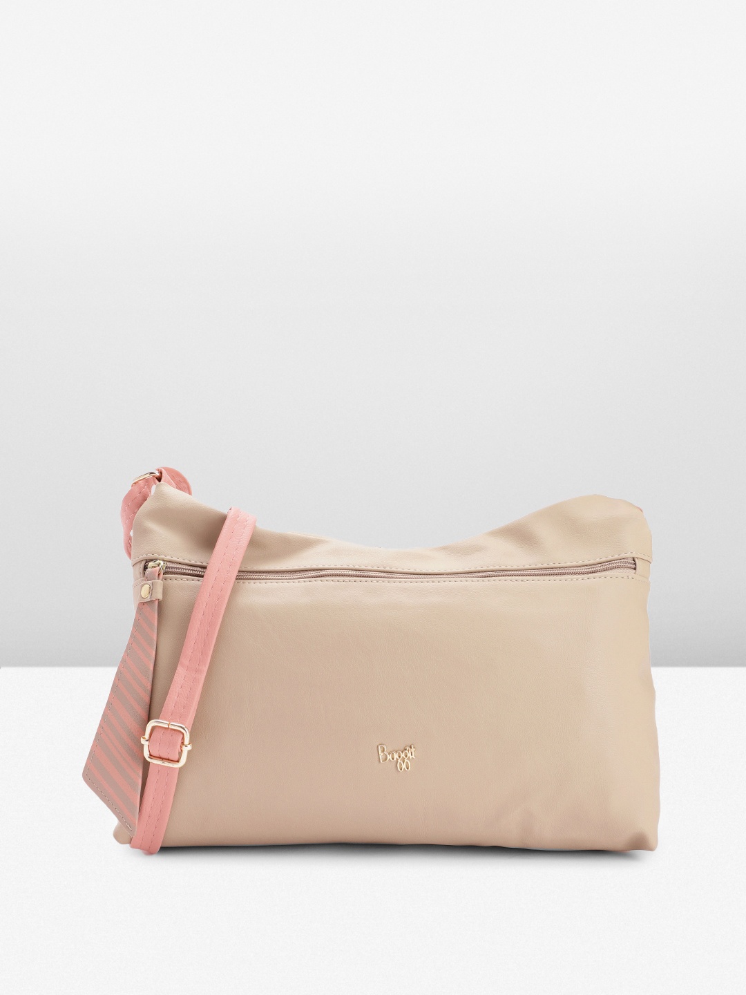 

Baggit Women Solid Sling Bag, Beige