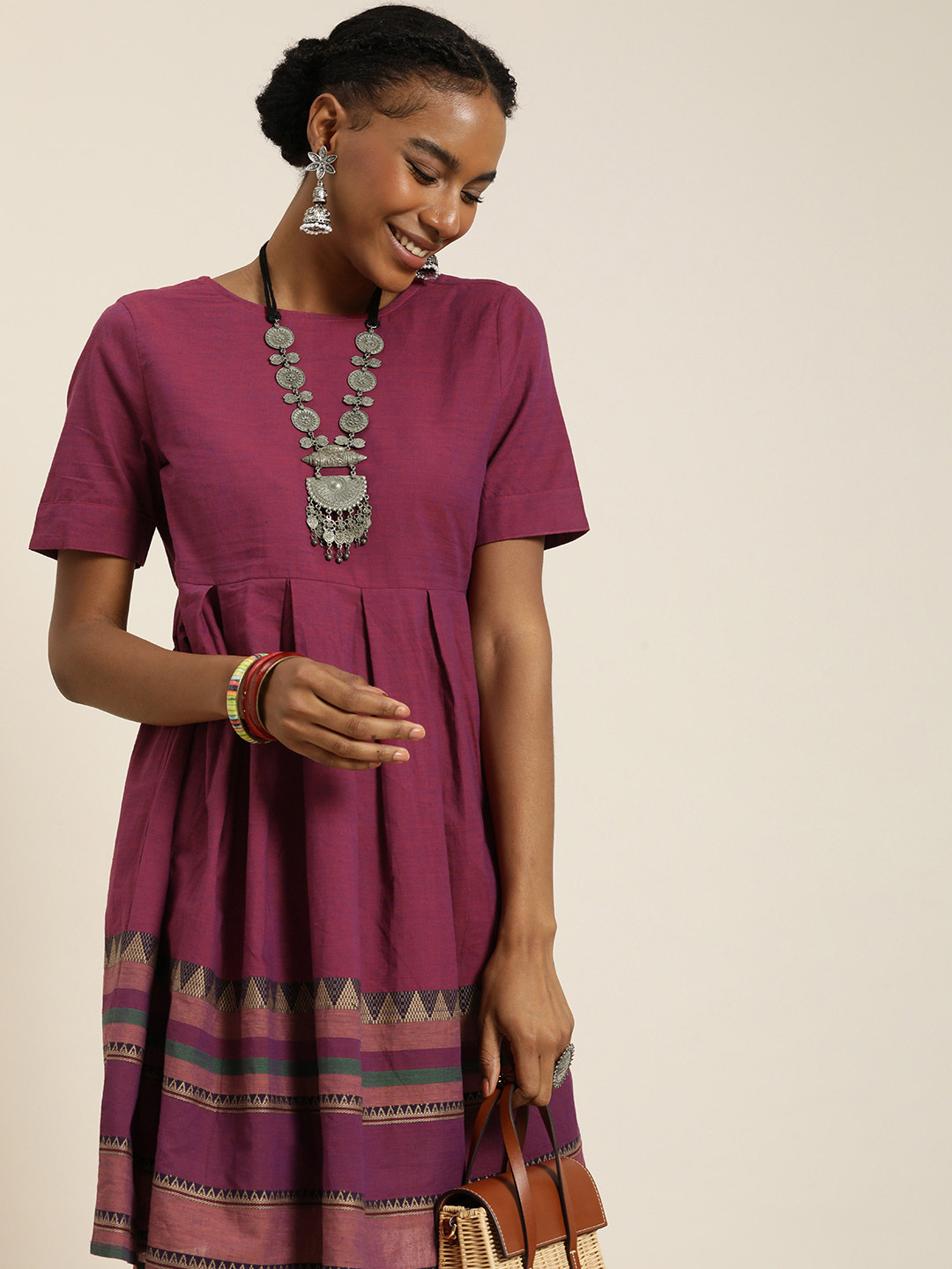 

Taavi Woven Legacy Pure Cotton Ethnic Motifs A-Line Dress, Magenta