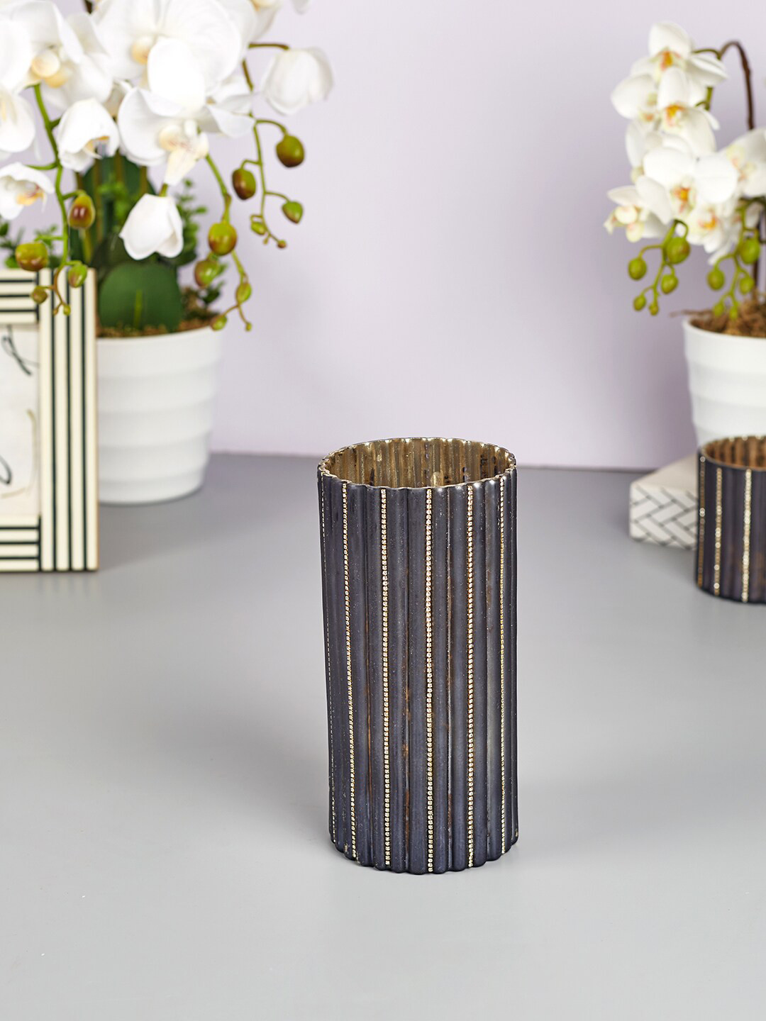 

HomeTown Grey Diamond Stud Phiona Glass Votive Candle Holder