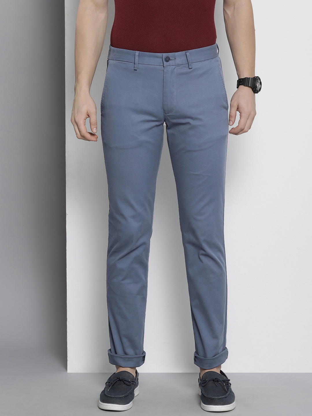 

Tommy Hilfiger Men Solid Mid-Rise Casual Trousers, Blue