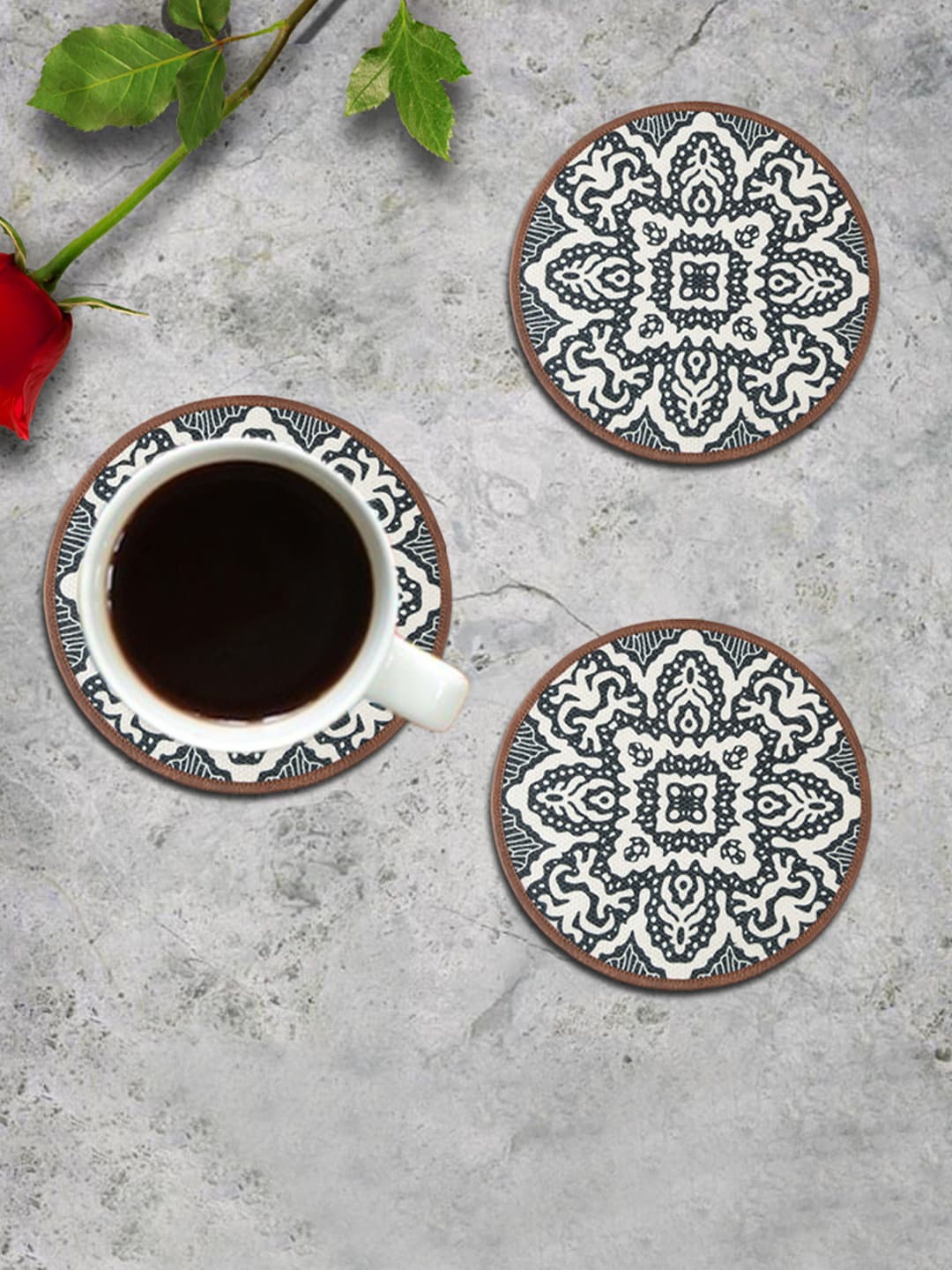 

Mona B White and Black 4 Pieces Medallion Printed Coasters