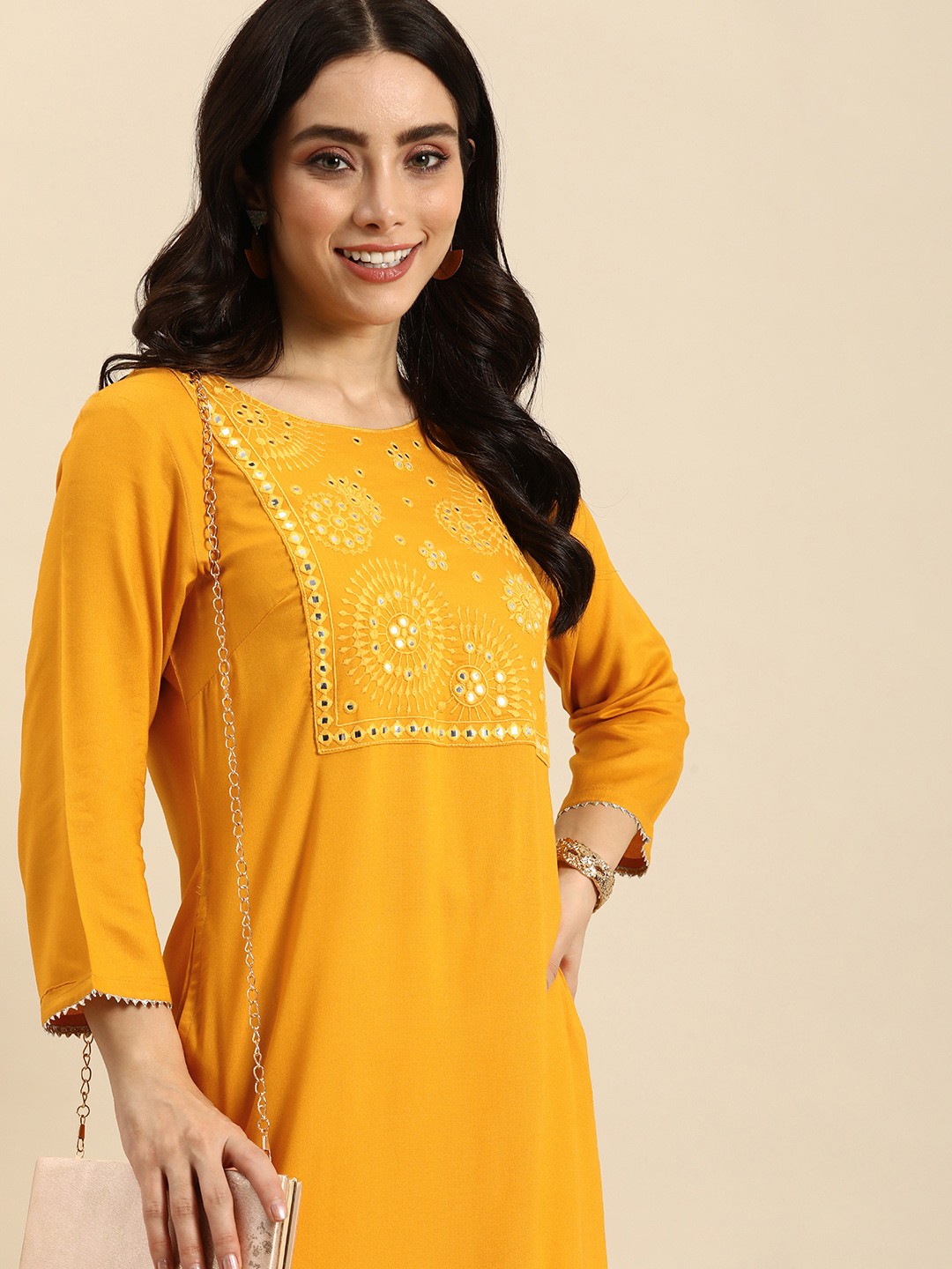 

Sangria Women Ethnic Motifs Yoke Design Mirror Work Kurta, Mustard