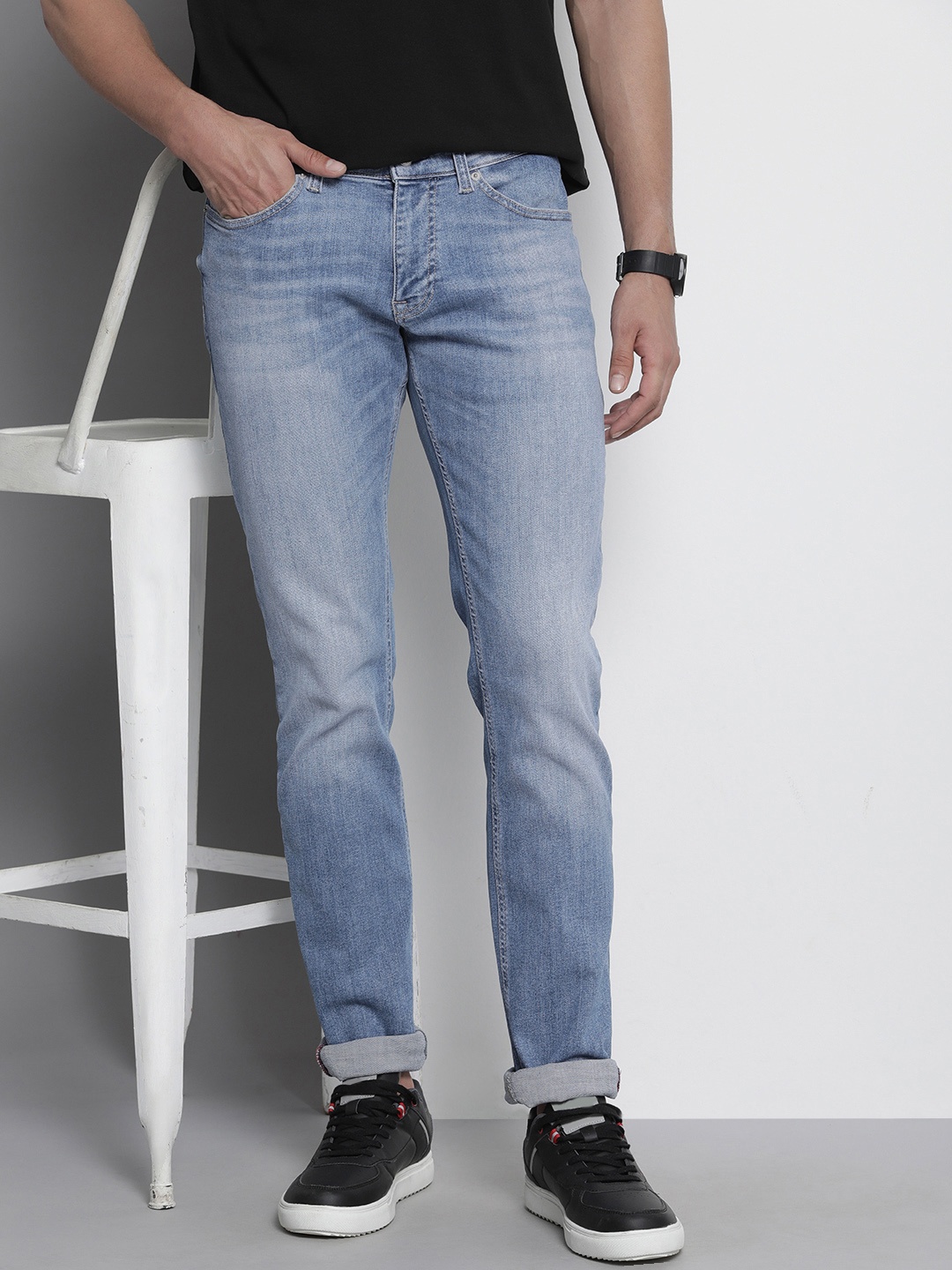 

Tommy Hilfiger Men Slim Fit Heavy Fade Stretchable Jeans, Blue