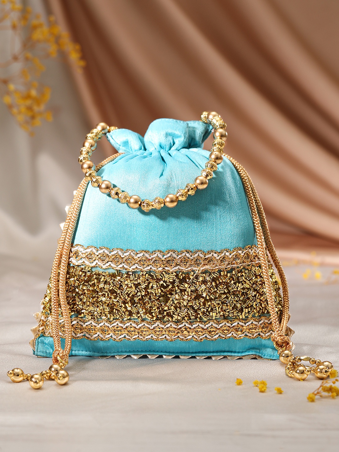 

Rubans Embellished Potli Clutch, Blue