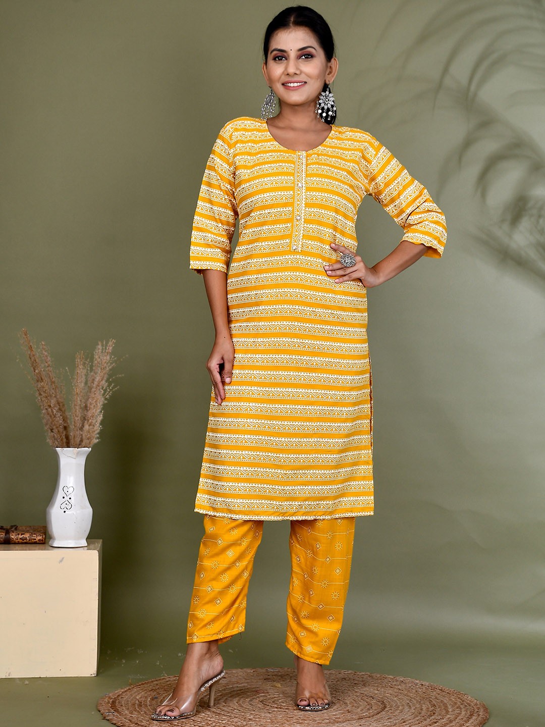 

Kesarya Women Ethnic Motifs Printed Round Neck Kurta with Trousers, Yellow