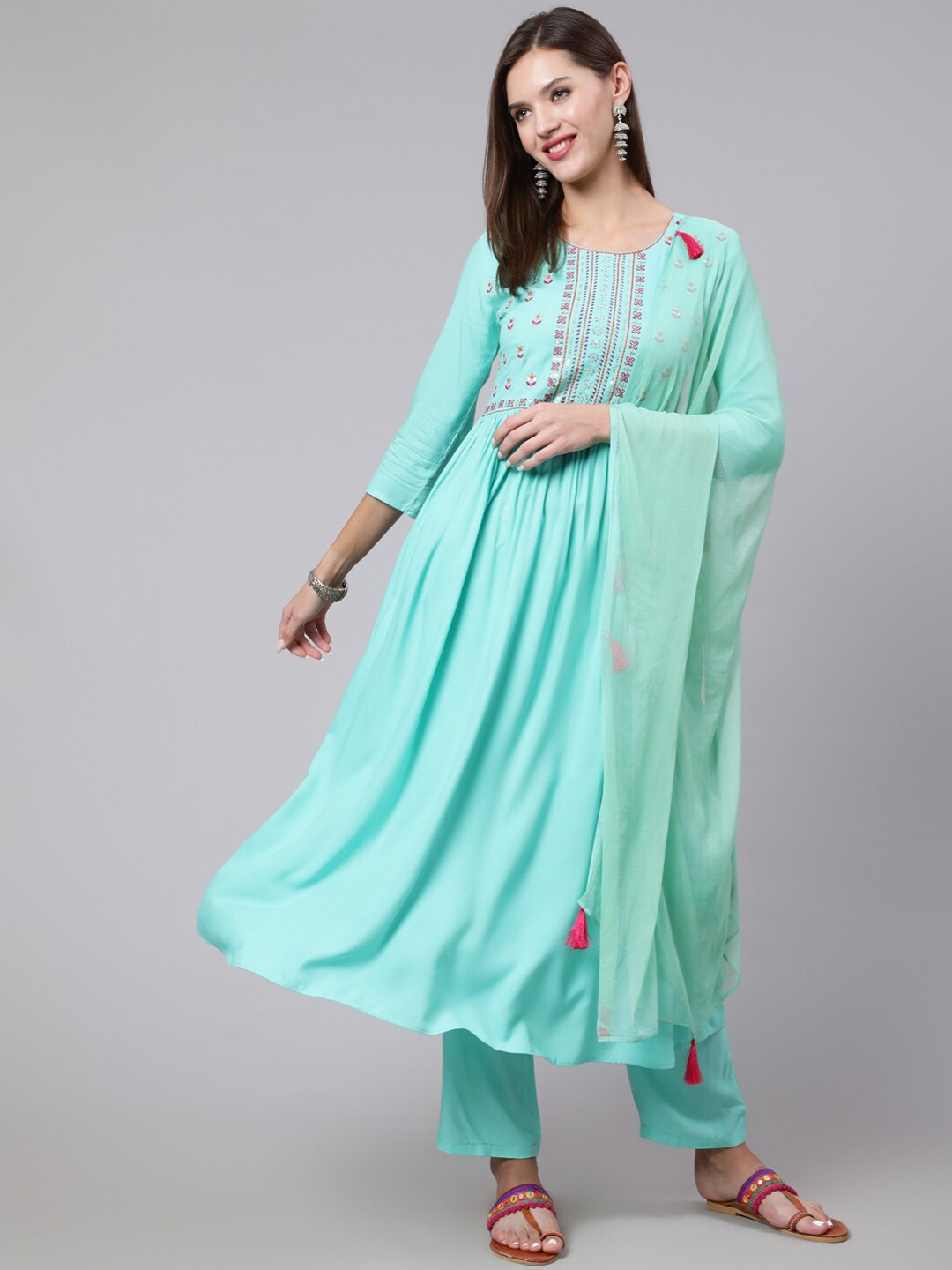 

GLAM ROOTS Ethnic Motifs Embroidered Empire Thread Work Kurta Set, Turquoise blue