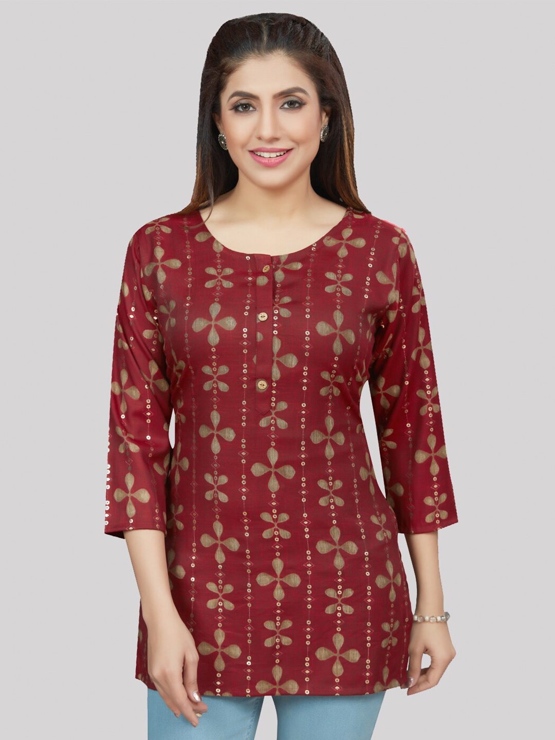 

Saree Swarg Floral Printed Sequinned Sequinned Kurti, Maroon