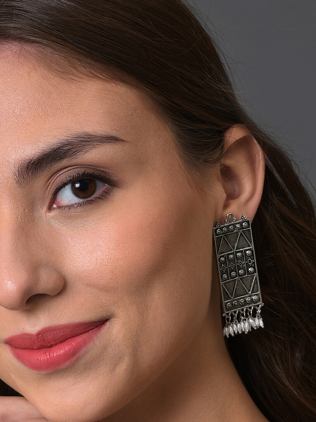 

SOHI Silver-Plated Contemporary Drop Earrings