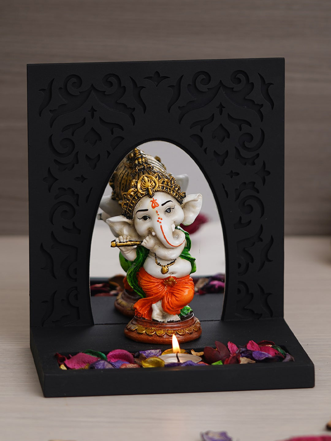 

eCraftIndia Black & Orange Colored Baal Ganesha Idol and Figurine Showpiece