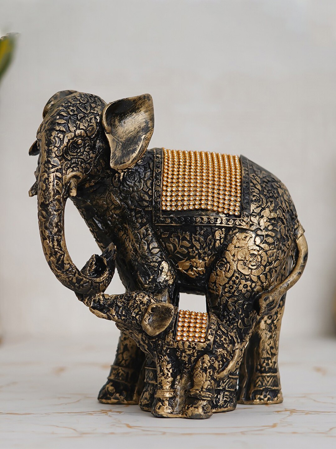 

eCraftIndia Gold-Toned Elephant Figurine Showpiece
