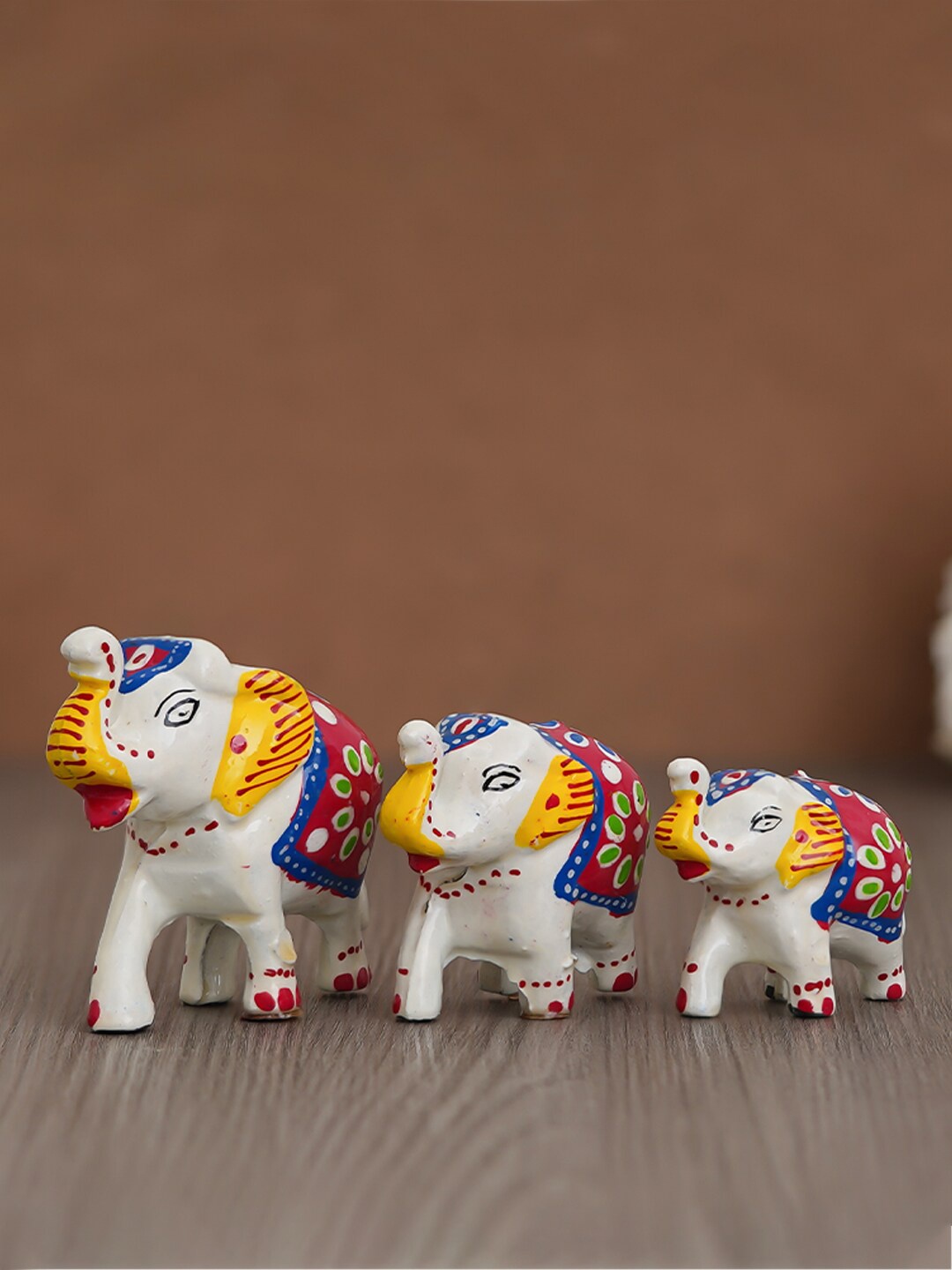 

eCraftIndia Red & White Set Of 3 Textured Elephant Showpieces
