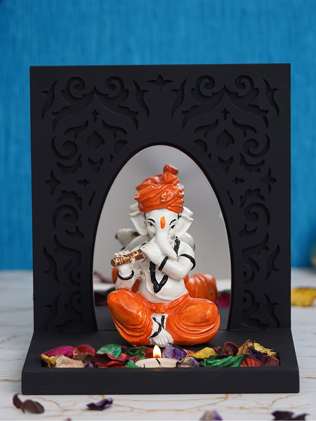 

eCraftIndia Black & Orange Ganesh Idol With Tea Light Holder Showpiece