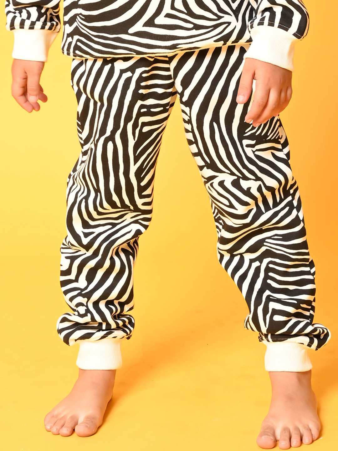 

Anthrilo Boys White Printed Relaxed High-Rise Easy Wash Trousers